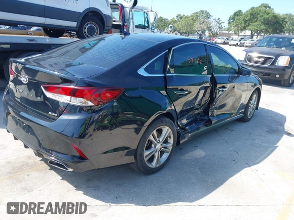 2018 Hyundai Sonata SEL with VIN 5NPE34AFXJH653446, listed as a IAAI auction lot 40011540 with 81,774 mi miles and . Bid and sale history available at DreamBid. Image 4.