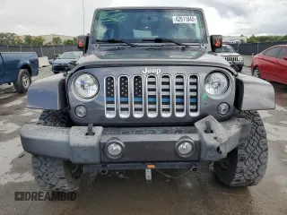 2016 Jeep Wrangler Unlimited 75th Anniversary with VIN 1C4BJWEG3GL216156, listed as a Copart auction lot 62611845 with 87,353 mi miles and Salvage title. Bid and sale history available at DreamBid. Image 5.