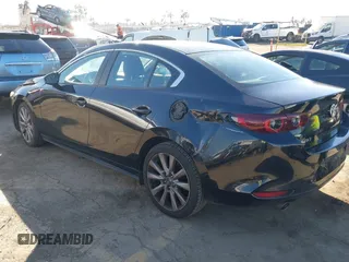 2022 Mazda 3 Carbon Edition z VIN JM1BPACLXN1507604, wystawiony jako IAAI lot #41408768 z przebiegiem 77 239 mil mil oraz . Historia ofert i sprzedaży dostępna na DreamBid. Obrazek 3.