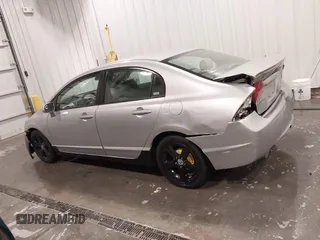 2009 Honda Civic LX z VIN 2HGFA16559H320179, wystawiony jako IAAI lot #41793459 z przebiegiem 172 878 mil mil oraz . Historia ofert i sprzedaży dostępna na DreamBid. Obrazek 14.