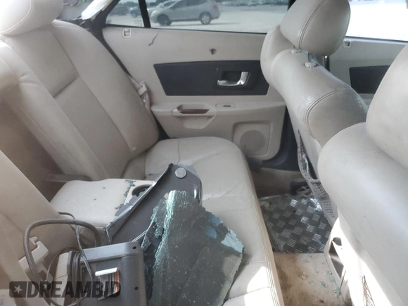 2005 Cadillac CTS z VIN 1G6DP567150233569, wystawiony jako Copart lot #51690995 z przebiegiem Nie podano mil oraz Szkoda całkowita • Salvage title. Historia ofert i sprzedaży dostępna na DreamBid. Obrazek 11.