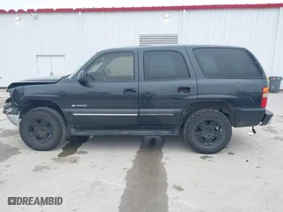 2003 Chevrolet Tahoe LS with VIN 1GNEC13V73R139530, listed as a IAAI auction lot 41598138 with 337,245 mi miles. Bid and sale history available at carsss.com. Image 14.