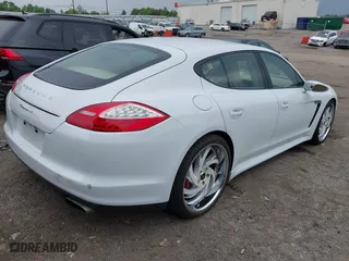 2013 Porsche Panamera with VIN WP0AA2A72DL014124, listed as a IAAI auction lot 42115410 with 184,206 mi miles. Bid and sale history available at carsss.com. Image 4.