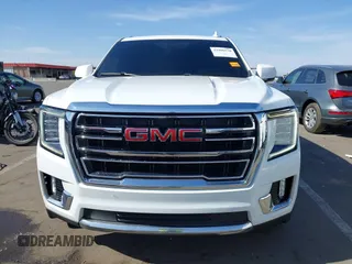 2021 GMC Yukon SLT z VIN 1GKS1BKD8MR250738, wystawiony jako IAAI lot #41996570 z przebiegiem 85 905 mil mil oraz . Historia ofert i sprzedaży dostępna na DreamBid. Obrazek 13.