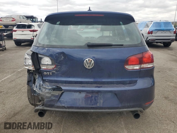 2011 Volkswagen GTI z VIN WVWGV7AJ2BW041102, wystawiony jako Copart lot #53326145 z przebiegiem 68 207 mil mil oraz Szkoda całkowita • Salvage title. Historia ofert i sprzedaży dostępna na DreamBid. Obrazek 6.