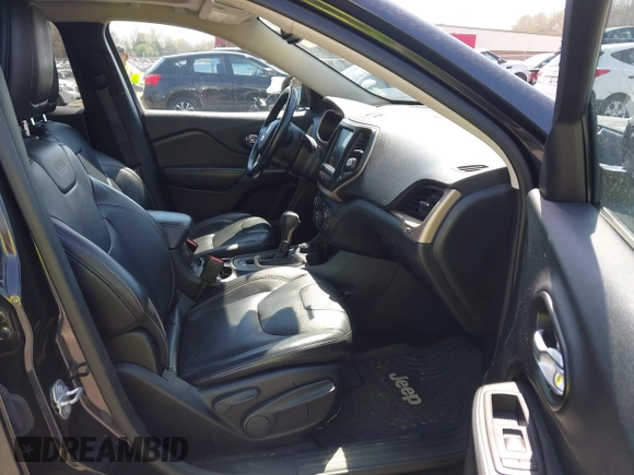 2015 Jeep Cherokee Limited with VIN 1C4PJMDS9FW711040, listed as a IAAI auction lot 41904050 with 137,742 mi miles. Bid and sale history available at carsss.com. Image 5.