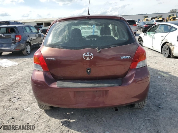2009 Toyota Yaris with VIN JTDKT903095229132, listed as a Copart auction lot 51512655 with 183,963 mi miles and Salvage Title. Bid and sale history available at carsss.com. Image 6.