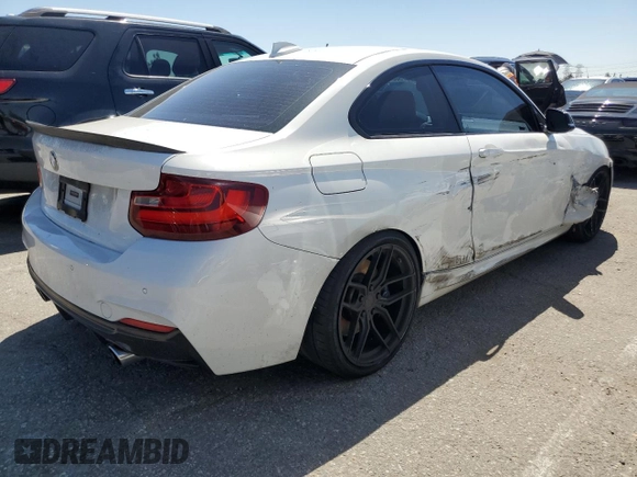 2015 BMW 2 Series 228i with VIN WBA1F9C53FVW98367, listed as a Copart auction lot 50378584 with 74,661 mi miles and Salvage Title. Bid and sale history available at carsss.com. Image 3.
