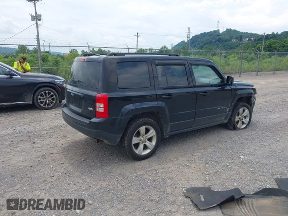 2014 Jeep Patriot Latitude with VIN 1C4NJRFB0ED892203, listed as a IAAI auction lot 42617739 with 100,607 mi miles and . Bid and sale history available at DreamBid. Image 4.