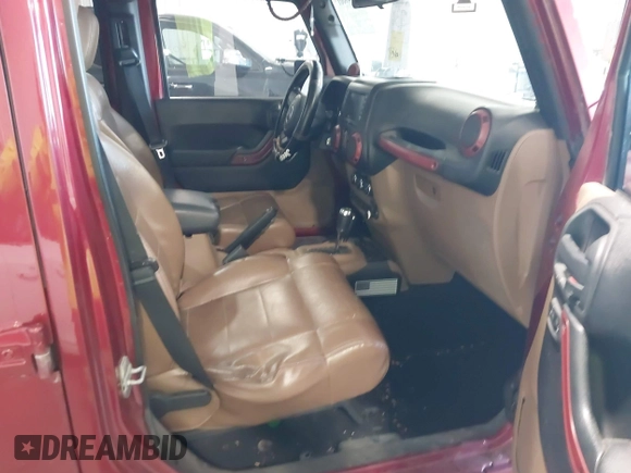 2011 Jeep Wrangler Unlimited Rubicon with VIN 1J4BA6H18BL584486, listed as a IAAI auction lot 42340661 with 152,896 mi miles and . Bid and sale history available at DreamBid. Image 5.