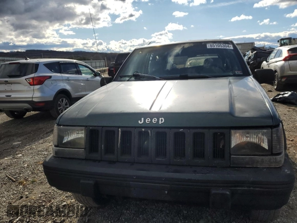 1993 Jeep Grand Cherokee Laredo with VIN 1J4GZ58S4PC580315, listed as a Copart auction lot 85105304 with 202,460 mi miles and Clean Title. Bid and sale history available at carsss.com. Image 5.