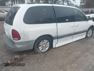1997 Dodge Grand Caravan with VIN 1B4GP54R5VB335635, listed as a IAAI auction lot 41433559 with Not Provided miles and . Bid and sale history available at DreamBid. Image 4.