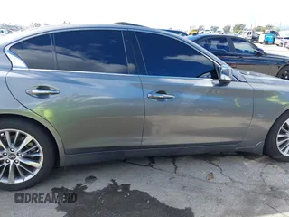 2019 Infiniti Q50 Luxe z VIN JN1EV7APXKM512617, wystawiony jako IAAI lot #41517907 z przebiegiem 46 619 mil mil oraz . Historia ofert i sprzedaży dostępna na DreamBid. Obrazek 13.
