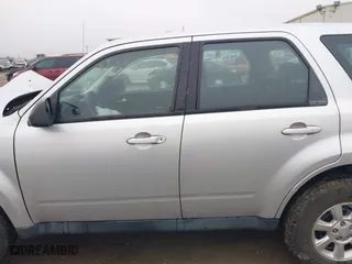 2011 Mazda Tribute Sport with VIN 4F2CY9C7XBKM01050, listed as a IAAI auction lot 41433870 with 122,287 mi miles. Bid and sale history available at carsss.com. Image 14.