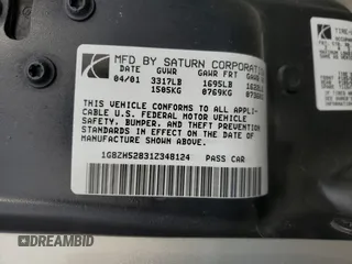 2001 Saturn SL z VIN 1G8ZH52831Z348124, wystawiony jako Copart lot #76058854 z przebiegiem 191 465 mil mil oraz Szkoda całkowita • Salvage title. Historia ofert i sprzedaży dostępna na DreamBid. Obrazek 12.