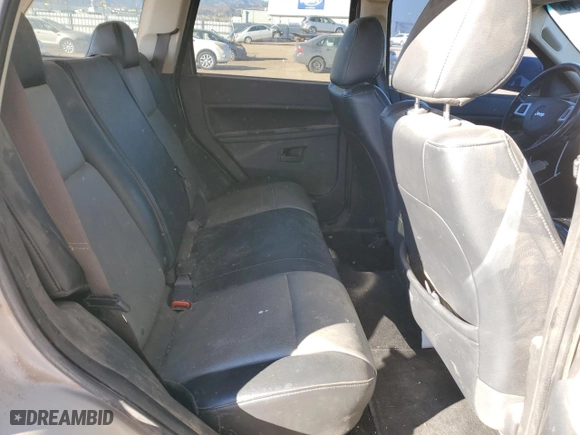 2008 Jeep Grand Cherokee Laredo with VIN 1J8HR48M28C132252, listed as a Copart auction lot 88986875 with 176,907 mi miles and Salvage Title. Bid and sale history available at carsss.com. Image 10.