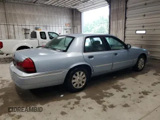 2003 Mercury Grand Marquis LS Premium z VIN 2MEHM75W33X645484, wystawiony jako Copart lot #58664585 z przebiegiem 145 064 mil mil oraz Tytuł czysty. Historia ofert i sprzedaży dostępna na DreamBid. Obrazek 3.