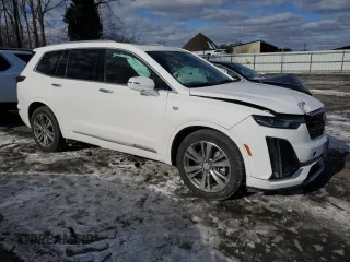 2022 Cadillac XT6 Premium Luxury with VIN 1GYKPCRS4NZ128684, listed as a Copart auction lot 87806525 with 23,571 mi miles and Salvage Title. Bid and sale history available at carsss.com. Image 4.