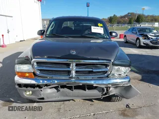 2001 Dodge Dakota Sport with VIN 1B7HL2AN21S319390, listed as a IAAI auction lot 40836729 with 118,823 mi miles. Bid and sale history available at carsss.com. Image 12.