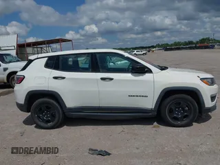 2018 Jeep Compass Sport with VIN 3C4NJCAB3JT263298, listed as a IAAI auction lot 42218194 with 104,604 mi miles and . Bid and sale history available at DreamBid. Image 12.