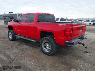 2014 Chevrolet Silverado 1500 LT with VIN 3GCUKREC7EG427441, listed as a IAAI auction lot 41576731 with 145,127 mi miles. Bid and sale history available at carsss.com. Image 3.