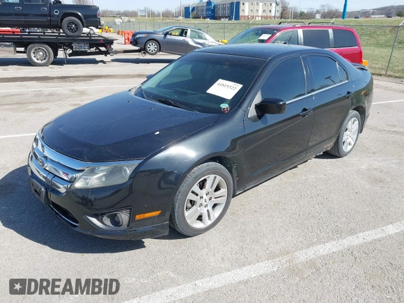 2011 Ford Fusion SE with VIN 3FAHP0HA8BR232236, listed as a IAAI auction lot 41819322 with 196,339 mi miles. Bid and sale history available at carsss.com. Image 2.