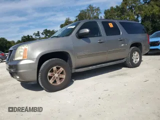 2012 GMC Yukon XL SLE with VIN 1GKS1HE06CR250652, listed as a Copart auction lot 74424294 with 129,208 mi miles and Salvage Title. Bid and sale history available at carsss.com. Image 1.