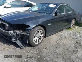 2015 BMW 5 Series 528i with VIN WBA5A5C56FD514814, listed as a IAAI auction lot 42052381 with 76,306 mi miles. Bid and sale history available at carsss.com. Image 23.