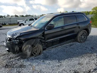 2018 Jeep Grand Cherokee Laredo E with VIN 1C4RJEAGXJC246874, listed as a Copart auction lot 56722005 with 101,493 mi miles and Salvage title. Bid and sale history available at DreamBid. Image 1.