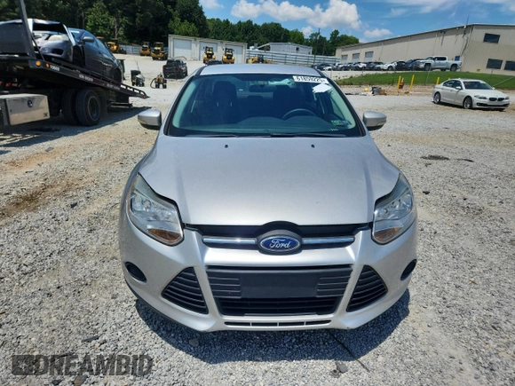2013 Ford Focus SE with VIN 1FADP3F22DL323418, listed as a Copart auction lot 61859225 with 62,415 mi miles and Salvage title. Bid and sale history available at DreamBid. Image 5.