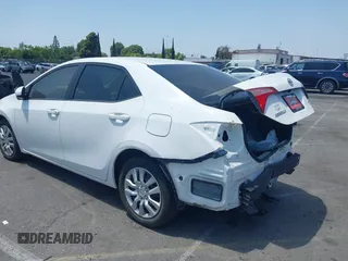 2018 Toyota Corolla L with VIN 5YFBURHE7JP810444, listed as a IAAI auction lot 42558647 with 74,794 mi miles and . Bid and sale history available at DreamBid. Image 3.