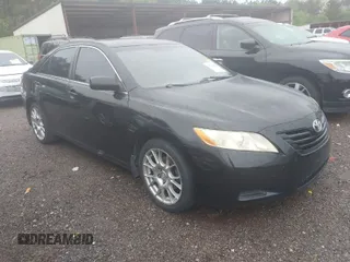2007 Toyota Camry CE with VIN JTNBE46K573000686, listed as a IAAI auction lot 41971943 with 302,136 mi miles. Bid and sale history available at carsss.com. Image 1.