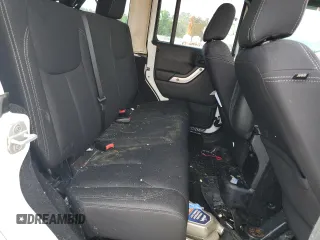 2013 Jeep Wrangler Unlimited Sahara with VIN 1C4HJWEG1DL516784, listed as a Copart auction lot 56382805 with 205,874 mi miles and Salvage title. Bid and sale history available at DreamBid. Image 11.