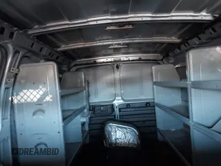 2015 Chevrolet Express Cargo Van with VIN 1GCWGFCF7F1281970, listed as a IAAI auction lot 41898214 with 145,078 mi miles. Bid and sale history available at carsss.com. Image 8.