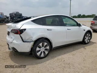 2024 Tesla Model Y Long Range with VIN 7SAYGDEE6RA290124, listed as a Copart auction lot 57662385 with 14,751 mi miles and Salvage title. Bid and sale history available at DreamBid. Image 3.