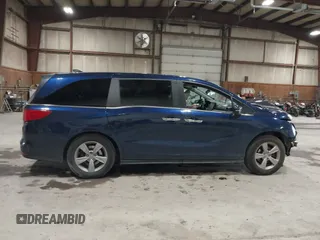 2019 Honda Odyssey EX-L z VIN 5FNRL6H71KB133485, wystawiony jako IAAI lot #42182410 z przebiegiem 95 571 mil mil oraz . Historia ofert i sprzedaży dostępna na DreamBid. Obrazek 14.