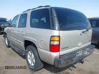 2004 GMC Yukon SLT with VIN 1GKEK13Z54R144181, listed as a IAAI auction lot 41702834 with 146,827 mi miles. Bid and sale history available at carsss.com. Image 3.