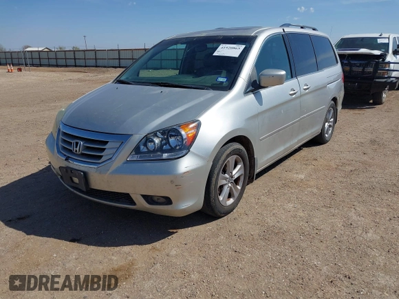 2008 Honda Odyssey Touring with VIN 5FNRL38918B059770, listed as a IAAI auction lot 41920865 with 231,599 mi miles. Bid and sale history available at carsss.com. Image 2.