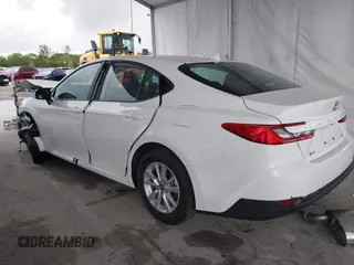 2025 Toyota Camry LE with VIN 4T1DAACK9SU112515, listed as a IAAI auction lot 41932562 with 587 mi miles and . Bid and sale history available at DreamBid. Image 3.
