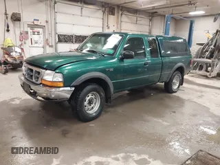 1999 Ford Ranger XL with VIN 1FTZR15V3XTA98120, listed as a IAAI auction lot 41955698 with 197,733 mi miles. Bid and sale history available at carsss.com. Image 2.