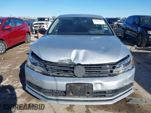 2015 Volkswagen Jetta SE z VIN 3VWD07AJ6FM326731, wystawiony jako IAAI lot #41066250 z przebiegiem 63 242 mil mil oraz . Historia ofert i sprzedaży dostępna na DreamBid. Obrazek 12.