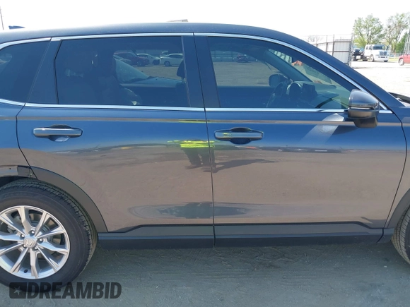 2025 Honda CR-V EX-L with VIN 2HKRS4H73SH401803, listed as a IAAI auction lot 41973265 with 13,588 mi miles and . Bid and sale history available at DreamBid. Image 14.