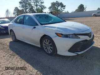 2019 Toyota Camry LE z VIN 4T1B11HK4KU218161, wystawiony jako IAAI lot #41738111 z przebiegiem 163 910 mil mil oraz . Historia ofert i sprzedaży dostępna na DreamBid. Obrazek 1.
