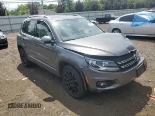 2013 Volkswagen Tiguan SE with VIN WVGBV7AX1DW009495, listed as a Copart auction lot 62289675 with Not provided miles and Salvage title. Bid and sale history available at DreamBid. Image 4.