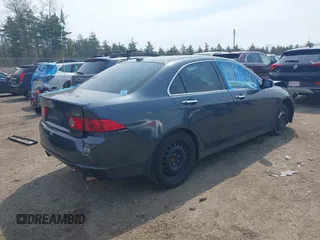 2007 Acura TSX Navi with VIN JH4CL96997C000035, listed as a IAAI auction lot 42090781 with 218,520 mi miles. Bid and sale history available at carsss.com. Image 4.