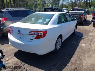 2012 Toyota Camry Hybrid XLE with VIN 4T1BD1FK4CU040019, listed as a IAAI auction lot 41869225 with 95,326 mi miles. Bid and sale history available at carsss.com. Image 4.