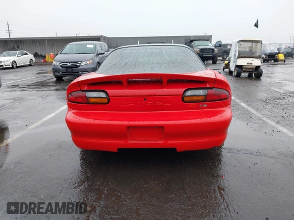 1999 Chevrolet Camaro Z28 z VIN 2G1FP22G2X2112215, wystawiony jako IAAI lot #41459474 z przebiegiem 106 832 mil mil oraz . Historia ofert i sprzedaży dostępna na DreamBid. Obrazek 16.