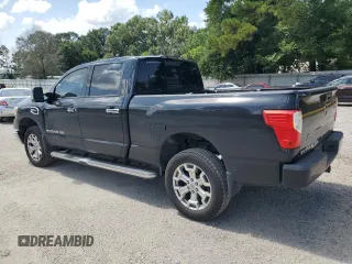 2017 Nissan Titan XD SV with VIN 1N6AA1F25HN549415, listed as a Copart auction lot 64027474 with 186,736 mi miles and Salvage Title. Bid and sale history available at carsss.com. Image 2.