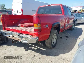 1999 Chevrolet Silverado 1500 LS with VIN 1GCEK19T0XZ143412, listed as a IAAI auction lot 41989365 with 1 mi miles. Bid and sale history available at carsss.com. Image 4.