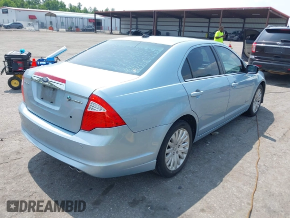 2010 Ford Fusion Hybrid with VIN 3FADP0L30AR387126, listed as a IAAI auction lot 42262640 with 203,973 mi miles and . Bid and sale history available at DreamBid. Image 4.
